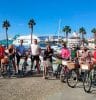 A group of people with rented bikes in Malaga, Spain